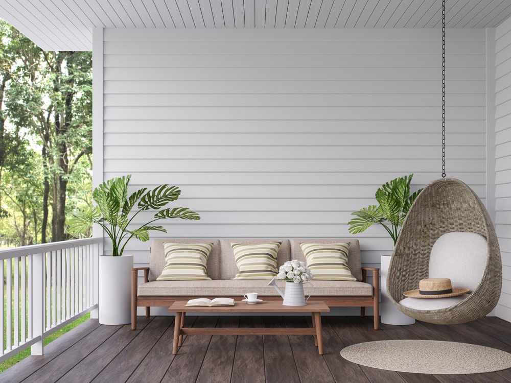 Vintage terrace with a view of nature in 3D, old wooden flooring and white plank wall - Factors to Consider When Planning an Outdoor Living Space